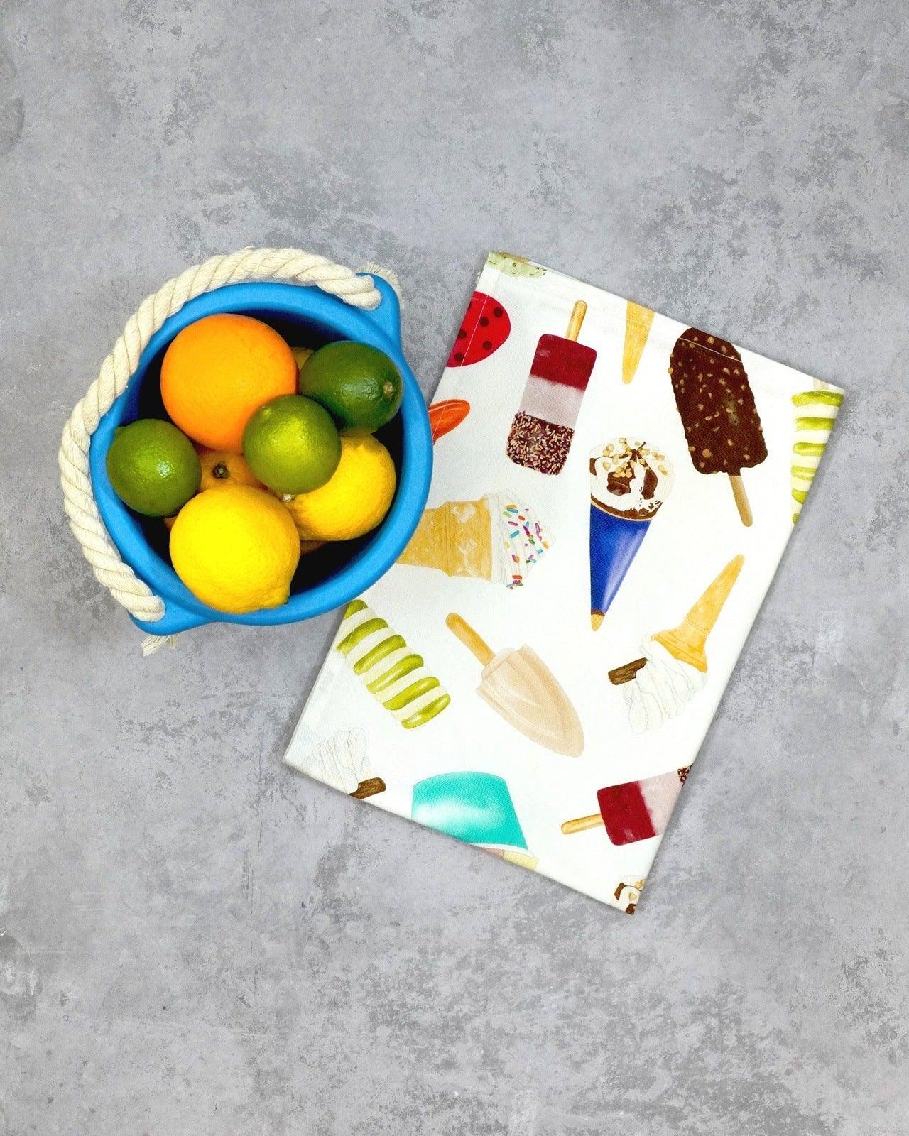 Ice cream tea towel featuring ice cream cones, ice cream scoops and ice lollies