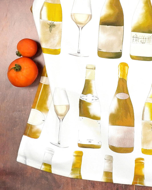 Close-up of the hand-drawn white wine bottles on a cotton tea towel