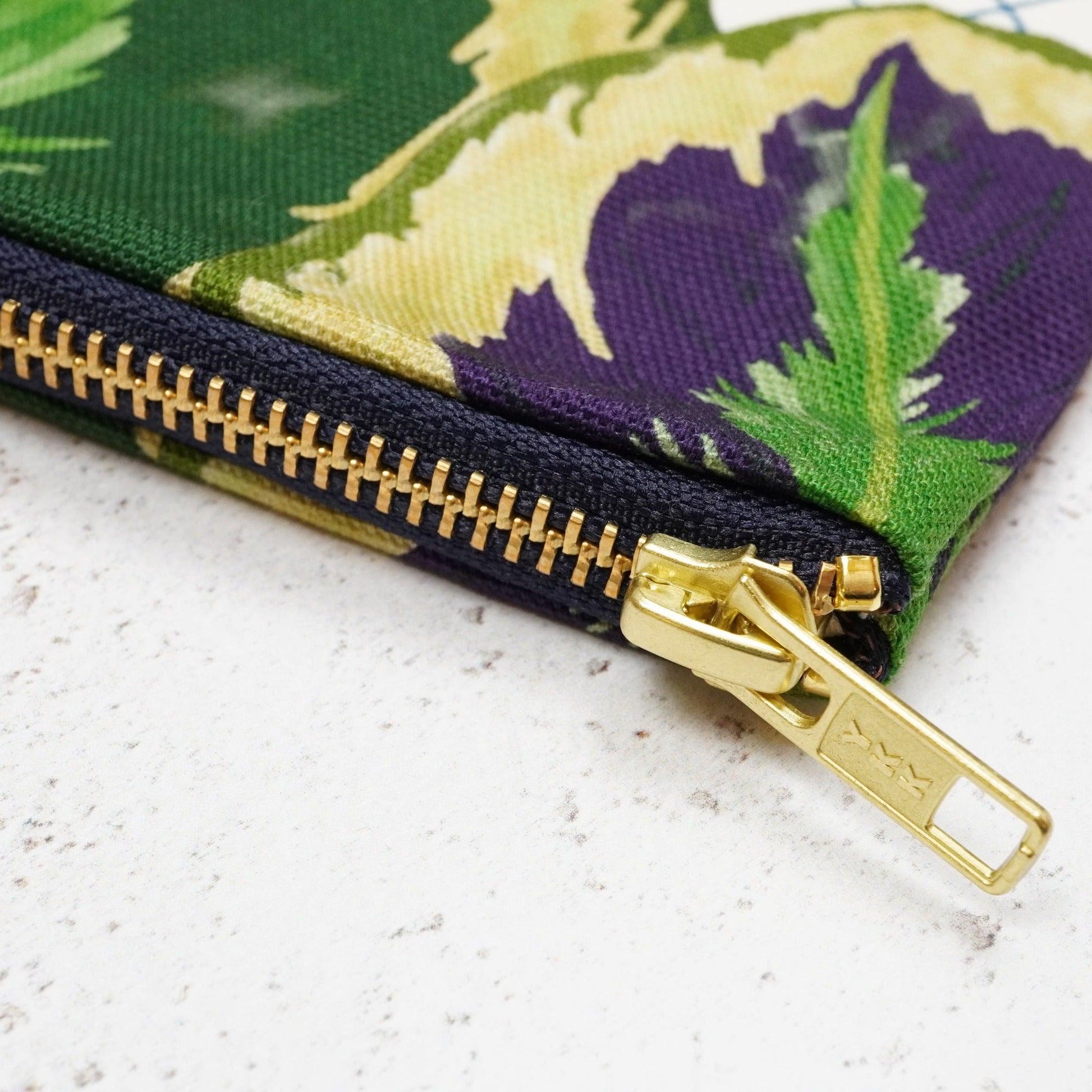 Nature inspired toiletry bag zip detail